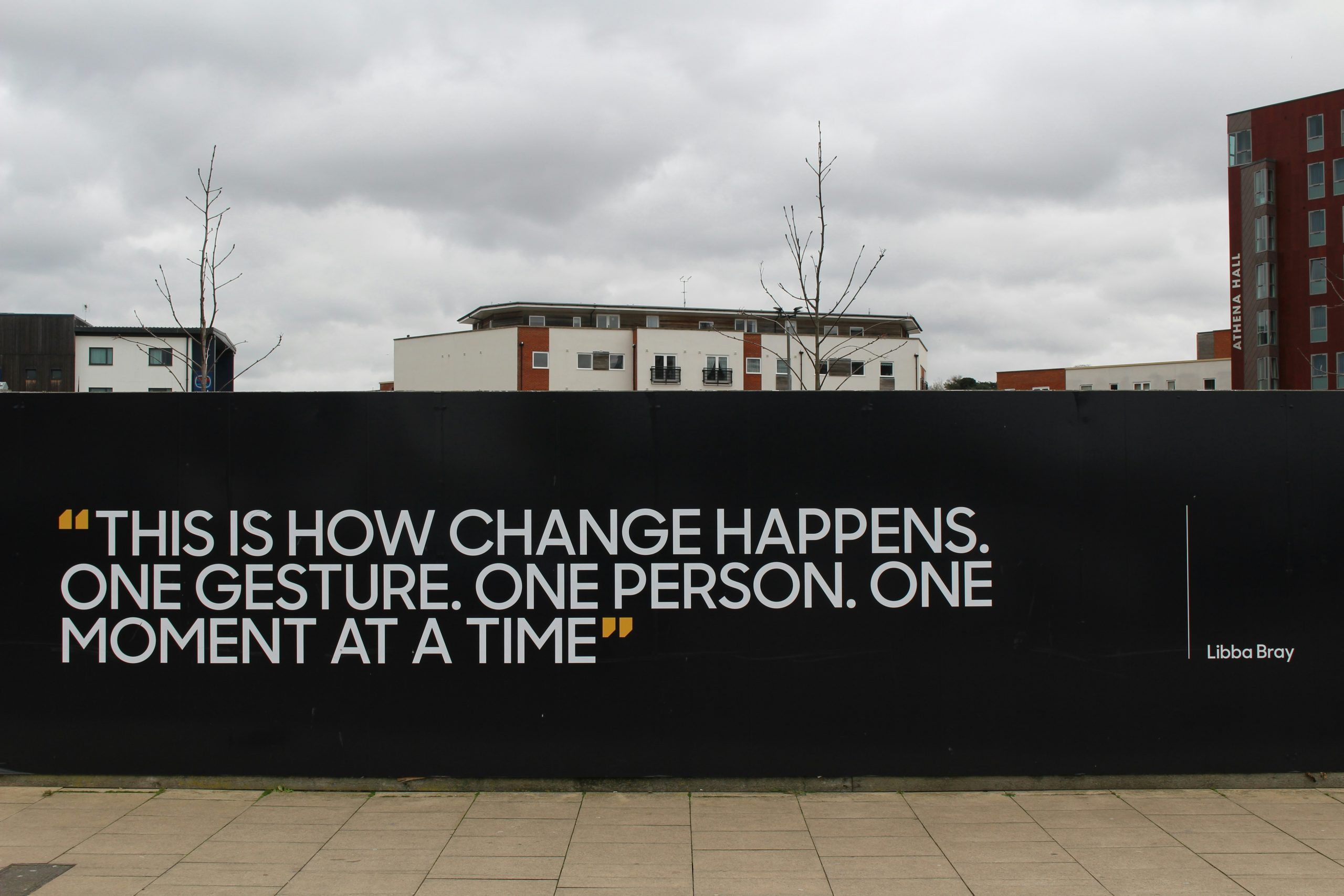 Inspirational quote that says "This is how change happens. One gesture. One person. One moment at a time."